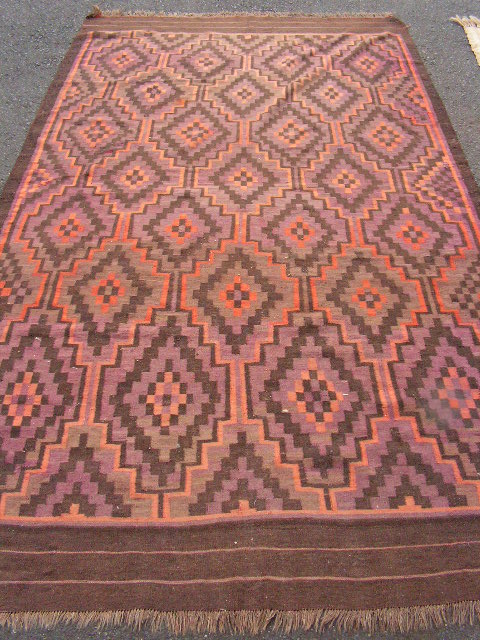 RUG #051, Aztec Brown 3.6m x 2m (has holes in it)